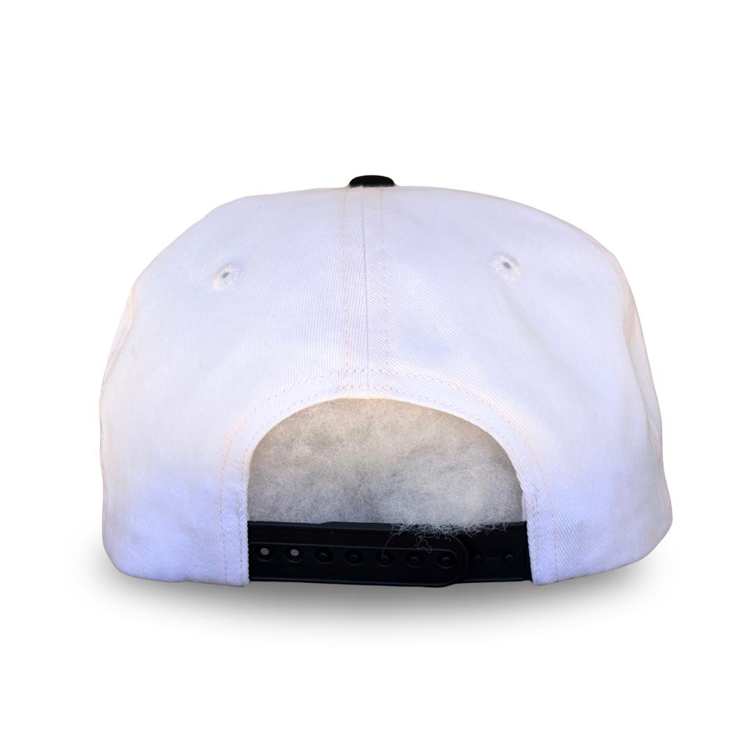 White structured baseball cap shown from the back, featuring a black snapback closure and a fluffy white faux-fur lining visible at the back opening.